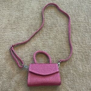 Pink sparkly urban outfitters purse